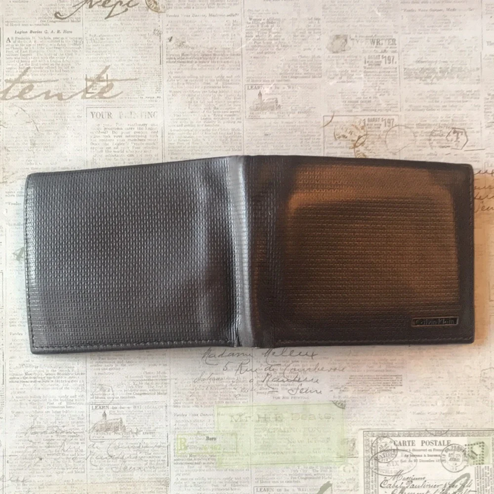 Calvin Klein Textured Leather Bi-Fold Wallet